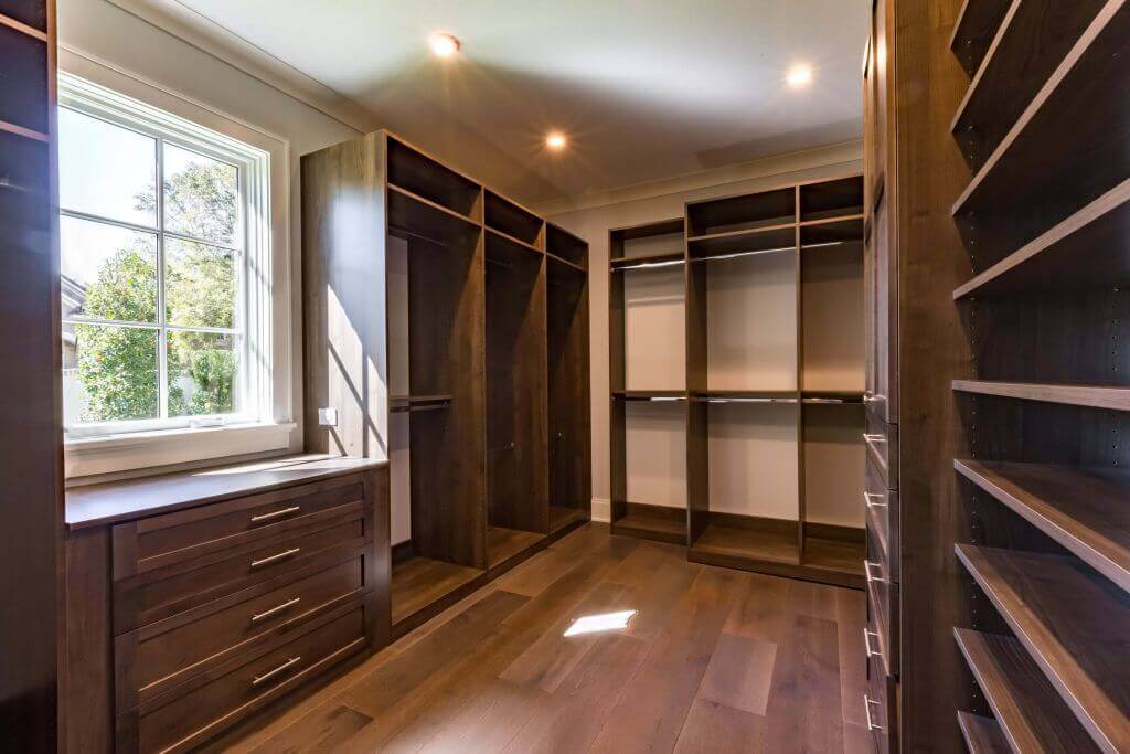 French Eclectic Design in Winter Park - master closet