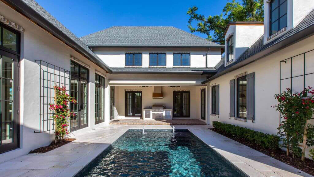 French Eclectic Design in Winter Park - pool and summer kitchen